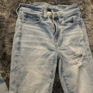 American eagle light washed skinny jeans ripped